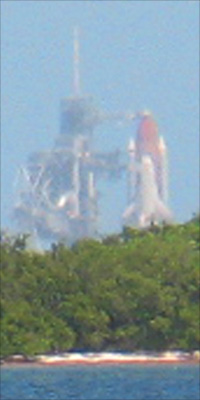 STS-132 on the launch pad through binoculars, 2010